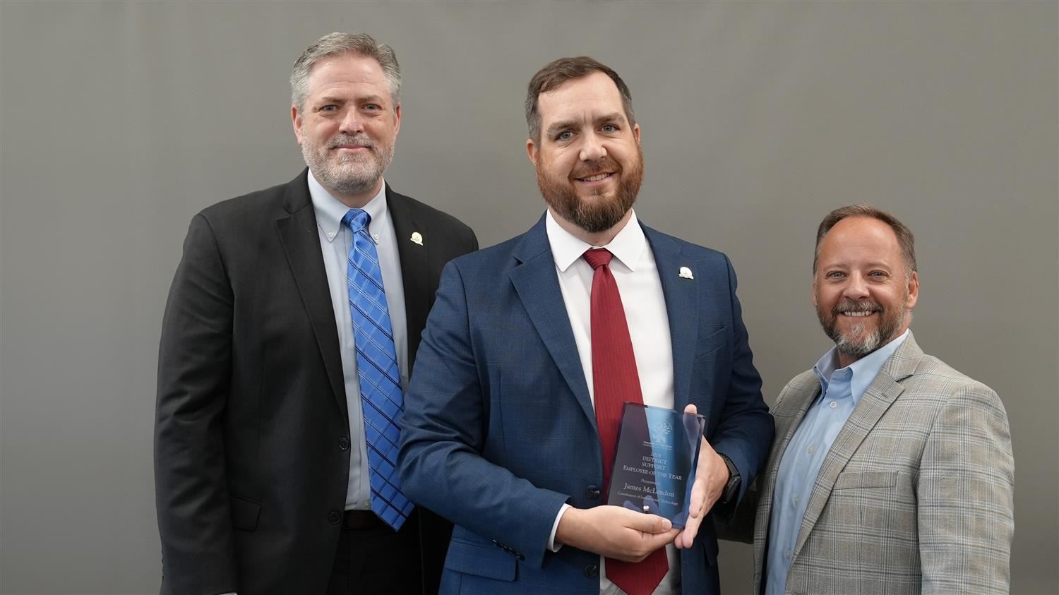 District Support Employee of the Year James McLendon - Coordinator of Instructional Technology pictured with Superintendent S