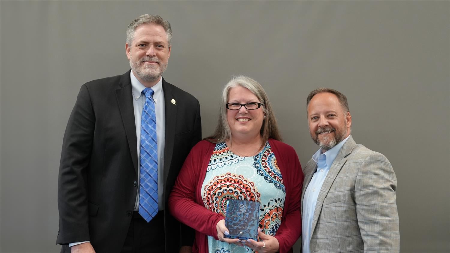 Austin Middle School Teacher of the Year Stacy Cochran pictured with Superintendent Steve Barnette and Paulding Education Fou