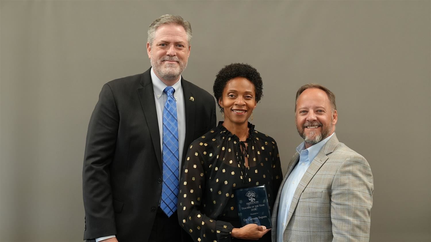 Dallas Elementary Teacher of the Year Dr. Carmen Segura pictured with Superintendent Steve Barnette and Paulding Education Fo