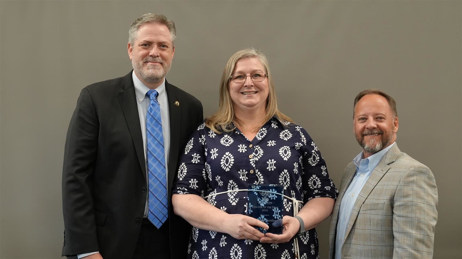 Dobbins Middle School Teacher of the Year Michelle Bentley pictured with Superintendent Steve Barnette and Paulding Education