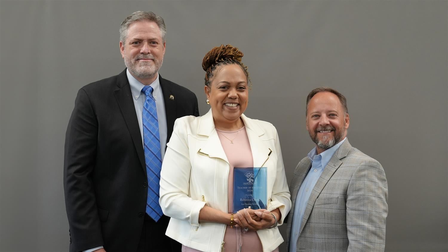 East Paulding Middle School Teacher of the Year Rebecca Clark pictured with Superintendent Steve Barnette and Paulding Educat