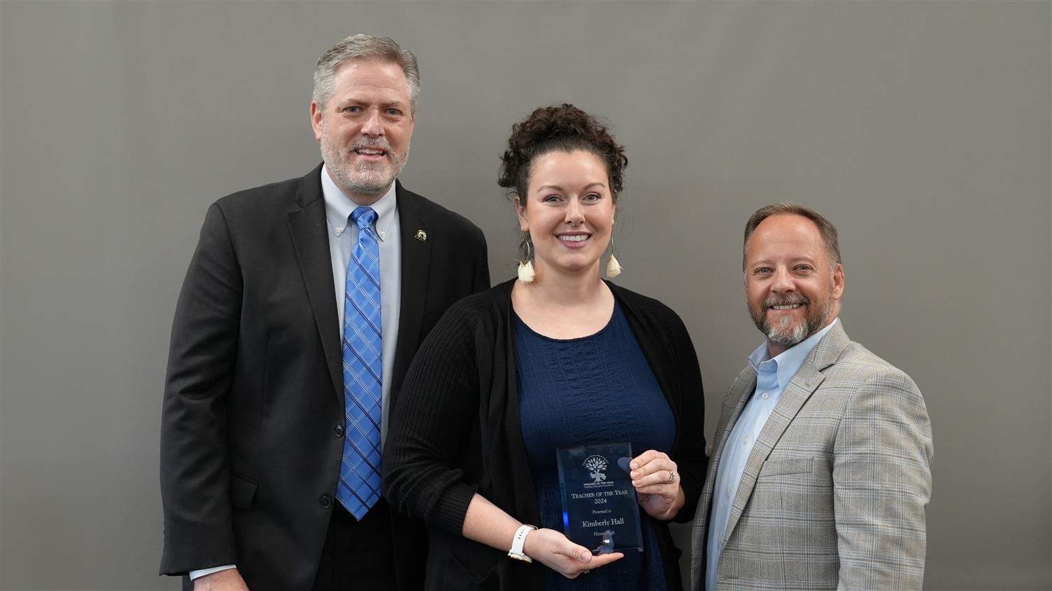 Hiram High School Teacher of the Year Kimberly Hall pictured with Superintendent Steve Barnette and Paulding Education Founda