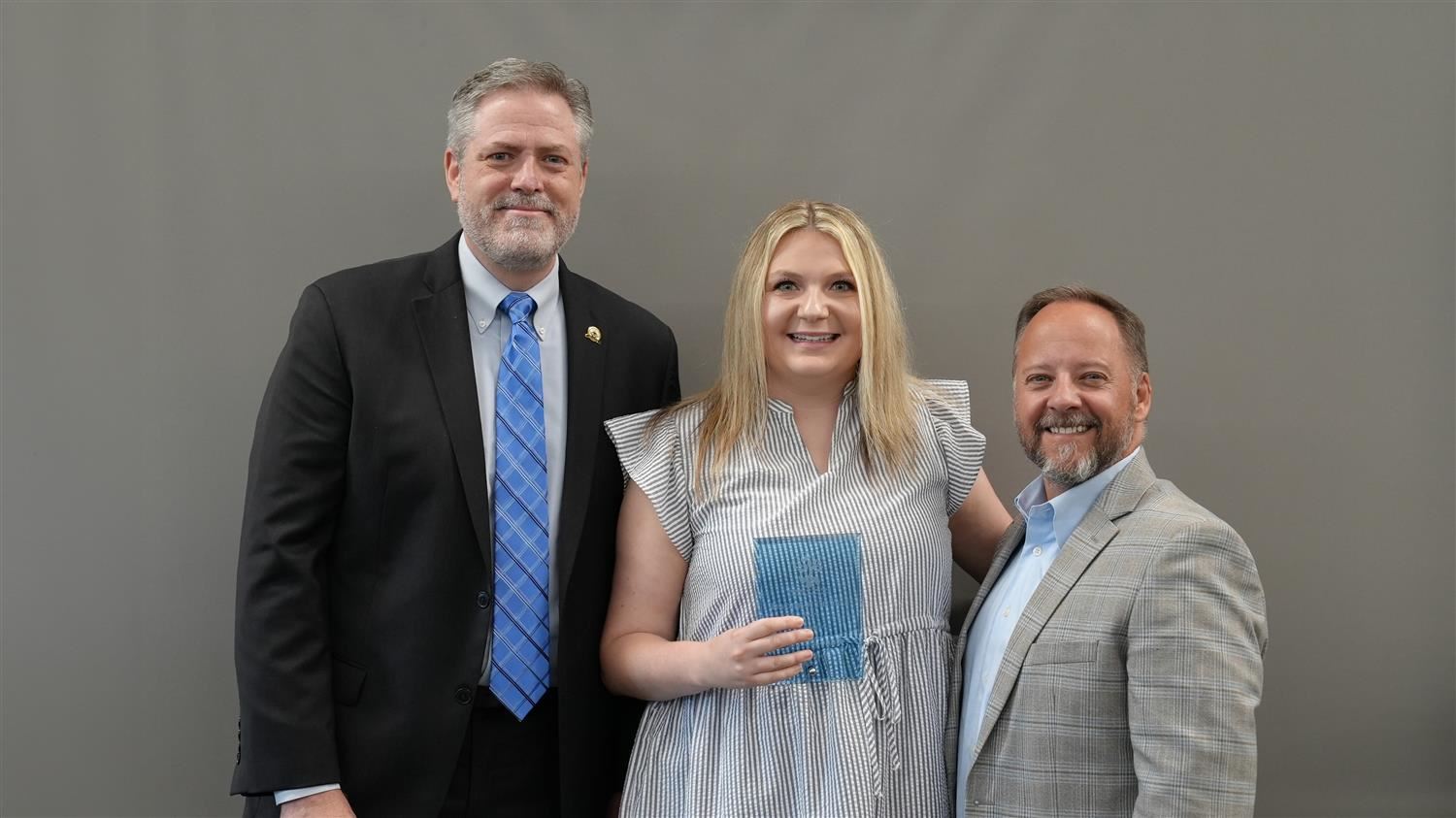 Hutchens Elementary Teacher of the Year Laura O'Connor pictured with Superintendent Steve Barnette and Paulding Education Fou
