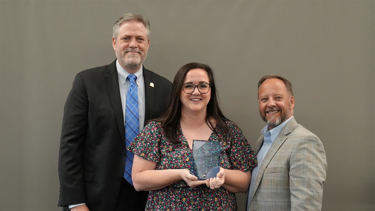 Paulding County High School Teacher of the Year Shea Roberts pictured with Superintendent Steve Barnette and Paulding Educati