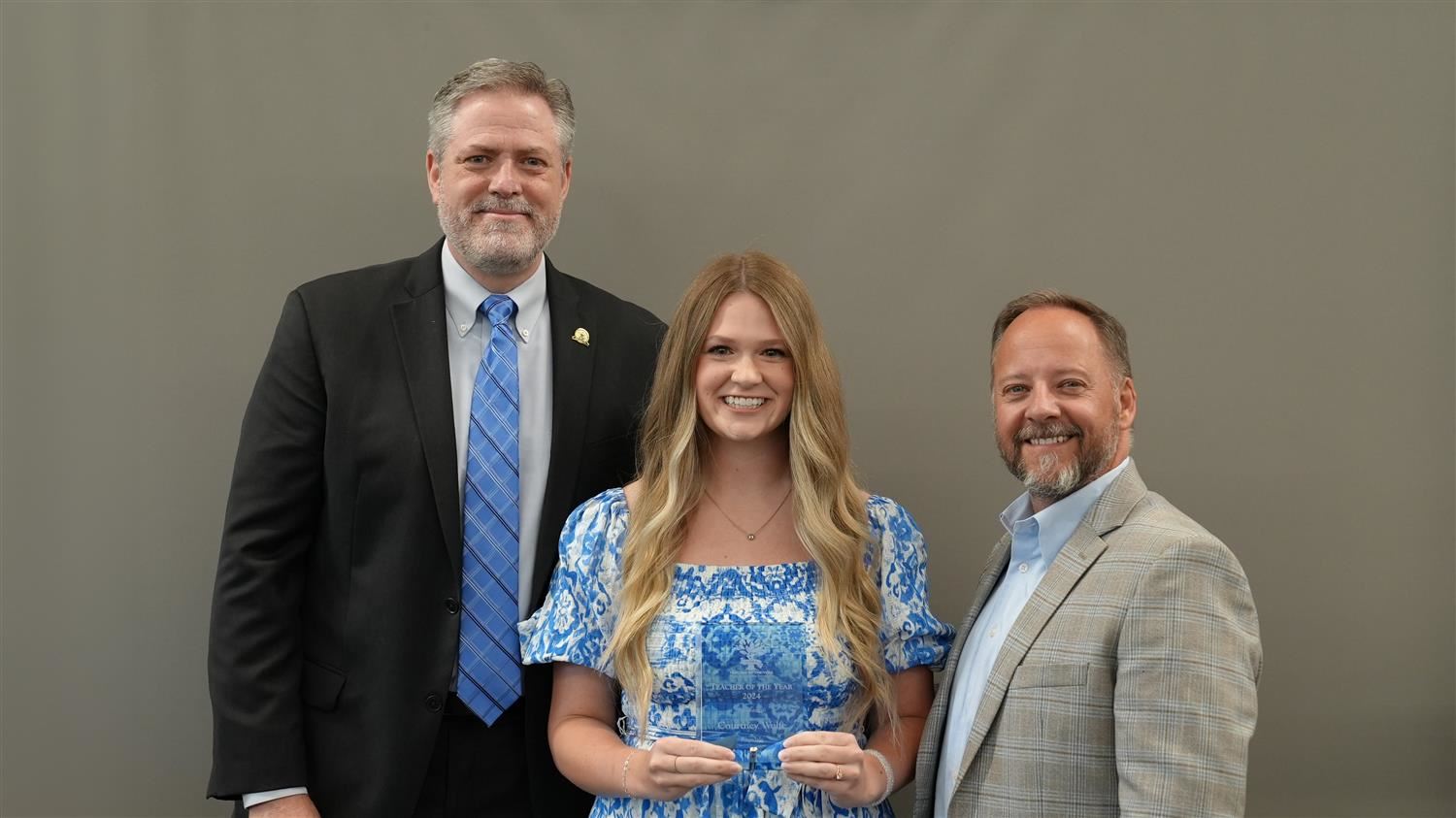Ragsdale Elementary Teacher of the Year Courtney Wolfe pictured with Superintendent Steve Barnette and Paulding Education Fou