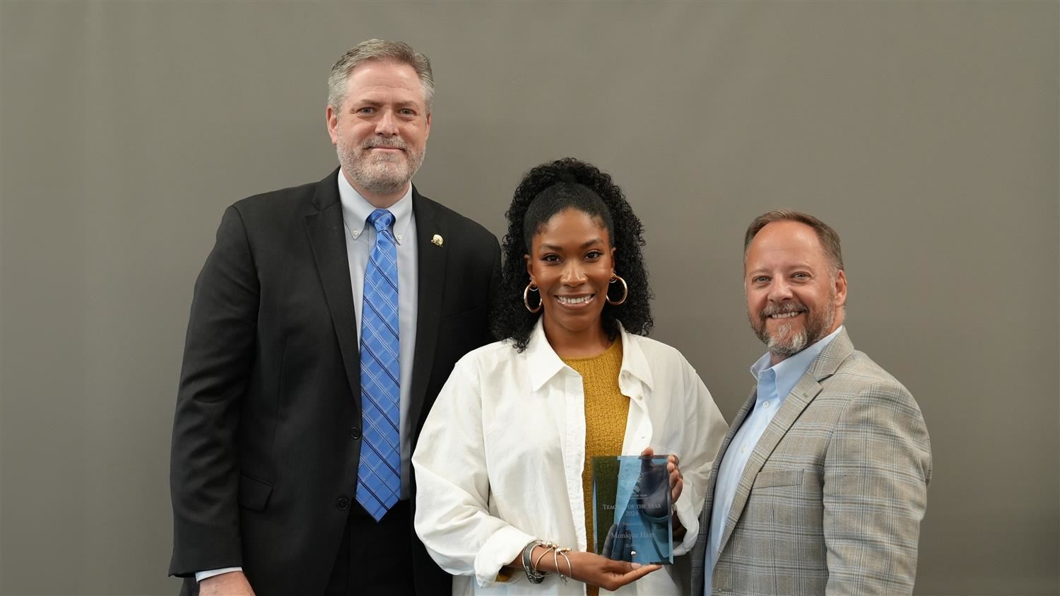 Roberts Elementary Teacher of the Year Monique Hart pictured with Superintendent Steve Barnette and Paulding Education Founda
