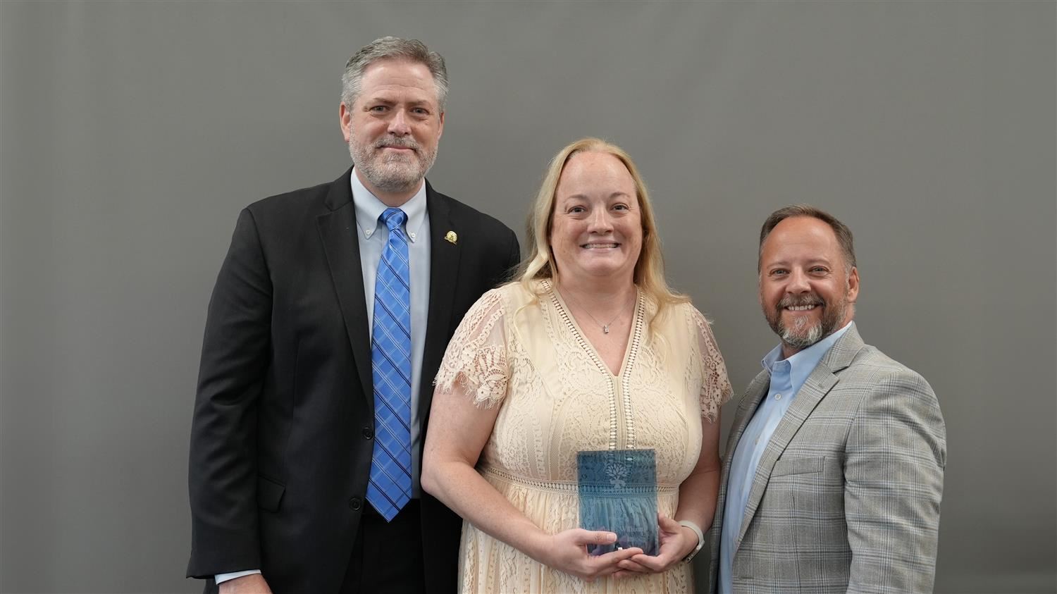 South Paulding Middle School Teacher of the Year Emily Williams pictured with Superintendent Steve Barnette and Paulding Education Foundation Board member Jim McMichen