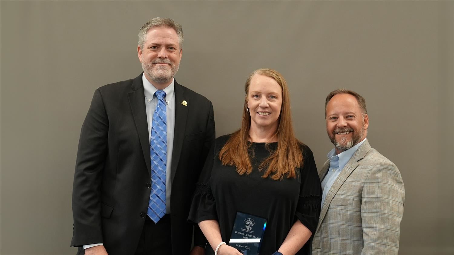 Union Elementary Teacher of the Year Stacey Kish pictured with Superintendent Steve Barnette and Paulding Education Foundation Board member Jim McMichen.
