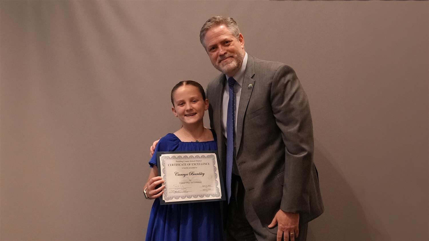Superintendent Steve Barnette pictured with Visual Art winner Shelton ES 5th grader Camryn Beardsley.