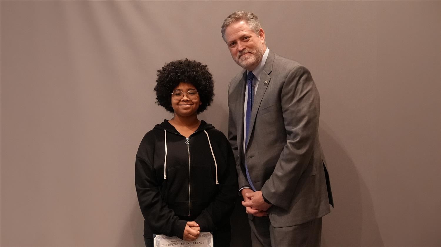 Superintendent Steve Barnette pictured with Visual Art winner Ritch MS 8th grader Tyenne Armstead.