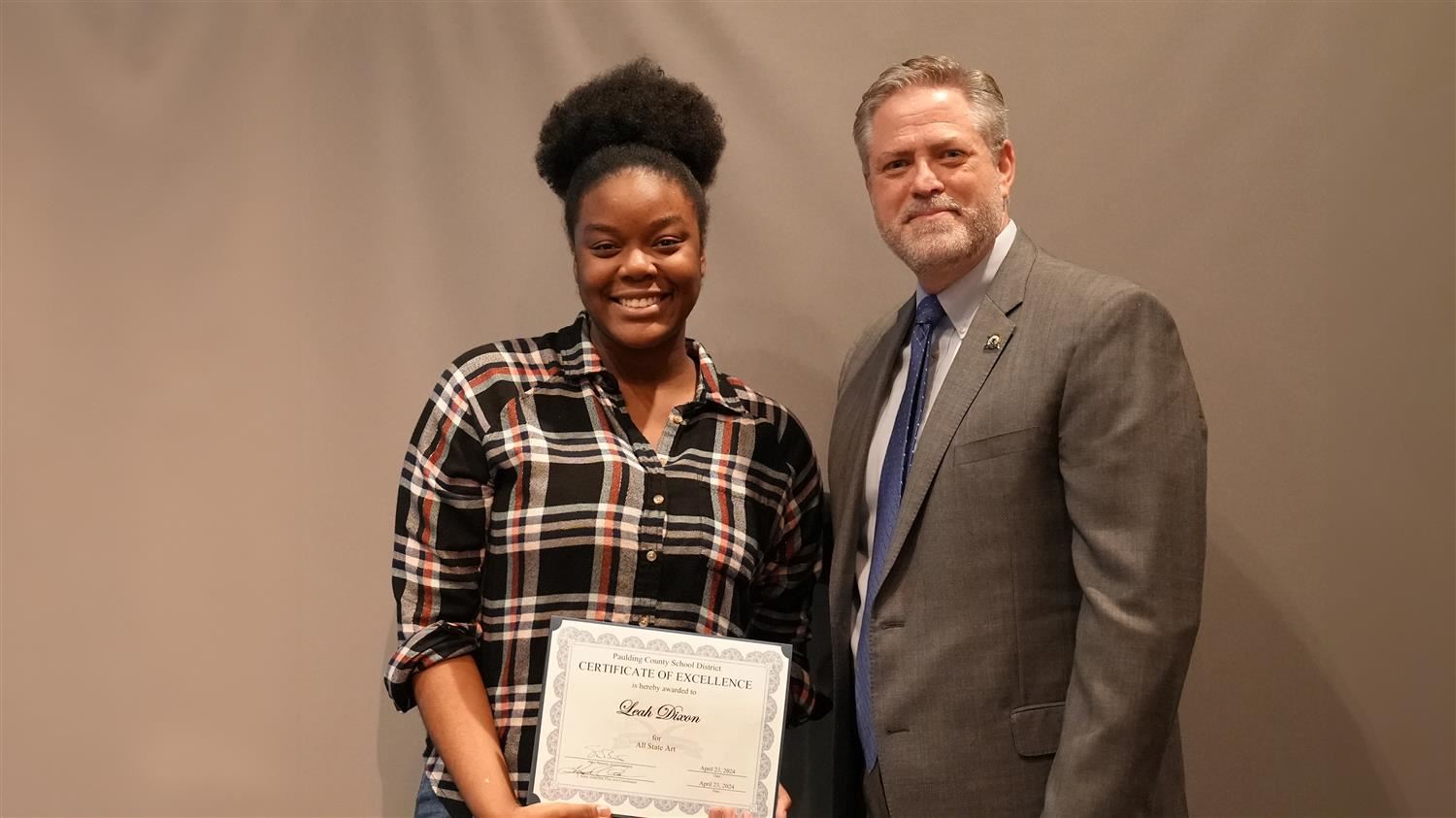 Superintendent Steve Barnette pictured with All State winner North Paulding HS 11th grader Leah Dixon.