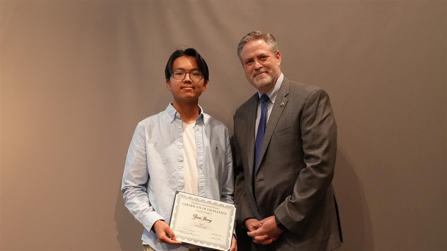Superintendent Steve Barnette pictured with All State winner Paulding County HS 10th grader Zirui Jiang.