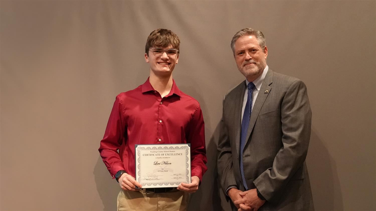 Superintendent Steve Barnette pictured with All State winner East Paulding HS 11th grader Levi Nilsen.