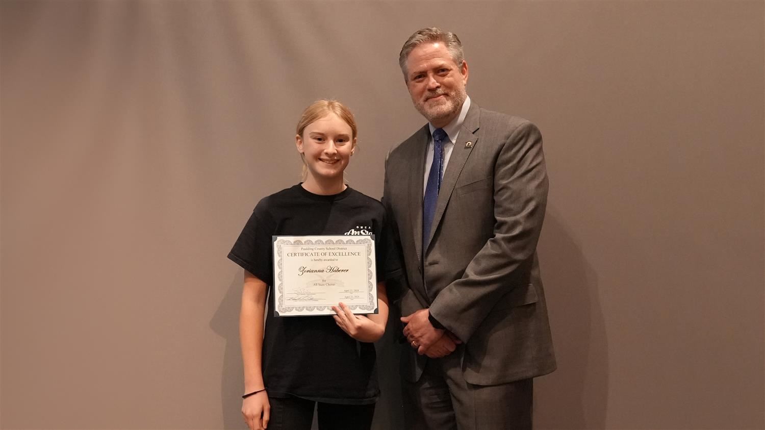 Superintendent Steve Barnette pictured with All State winner South Paulding MS 8th grader Zoriana Habere