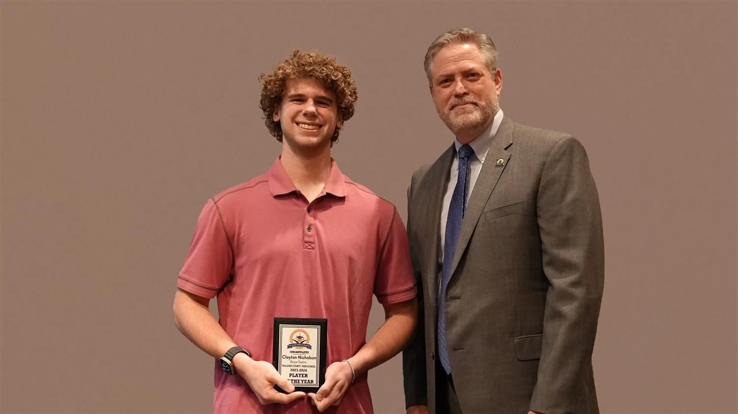 Superintendent Steve Barnette pictured with Winter Sports Player of the Year (Boys Swim) CJ Nicholson - Paulding County HS.