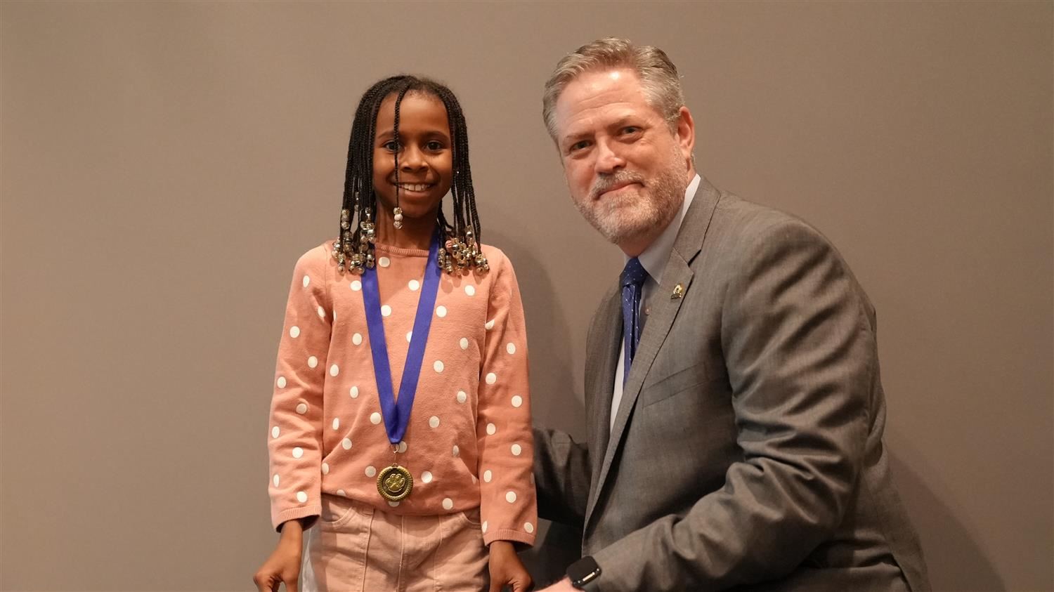 Superintendent Steve Barnette pictured with Character in Action (Fairness) winner Burnt Hickory ES 3rd grader Skylar Holloway.