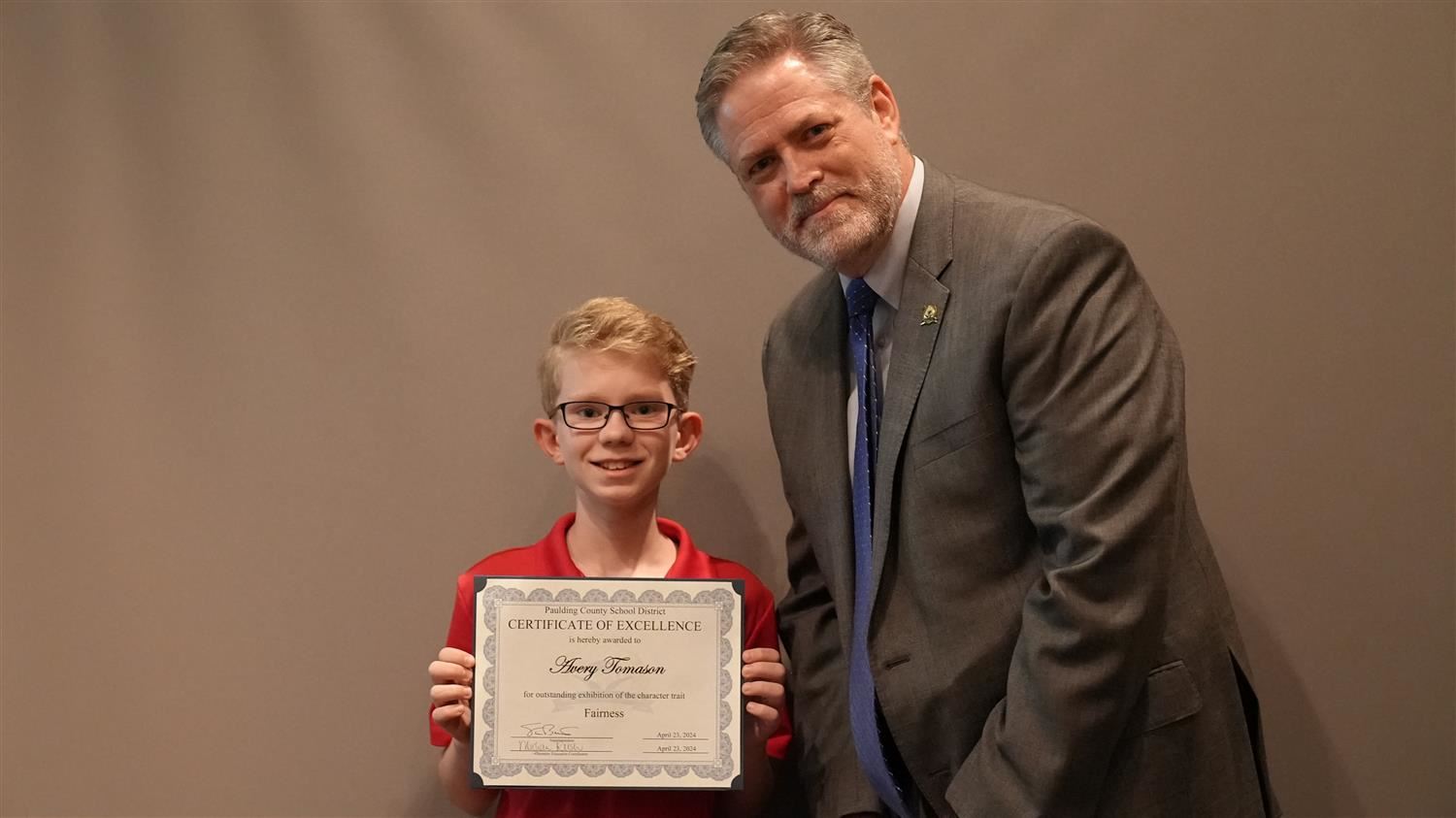 Superintendent Steve Barnette pictured with Character in Action (Fairness) winner Shelton ES 5th grader Avery Tomason.