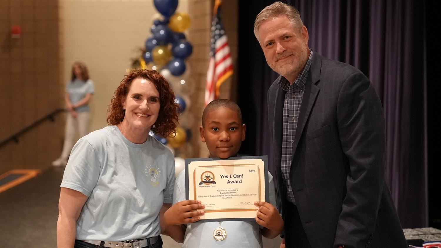 Brandon Hammond from Allgood ES pictured with Superintendent Steve Barnette and Senior Executive Director of Student Services