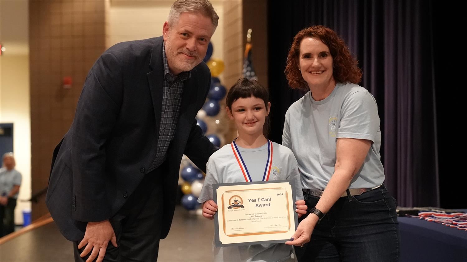 Nina Guignard from Burnt Hickory ES pictured with Superintendent Steve Barnette and Senior Executive Director of Student Serv