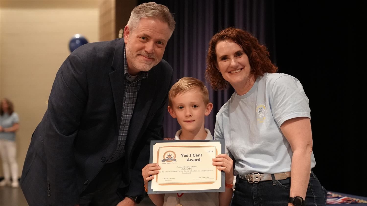 Nathaniel Ellis from New Georgia ES pictured with Superintendent Steve Barnette and Senior Executive Director of Student Serv