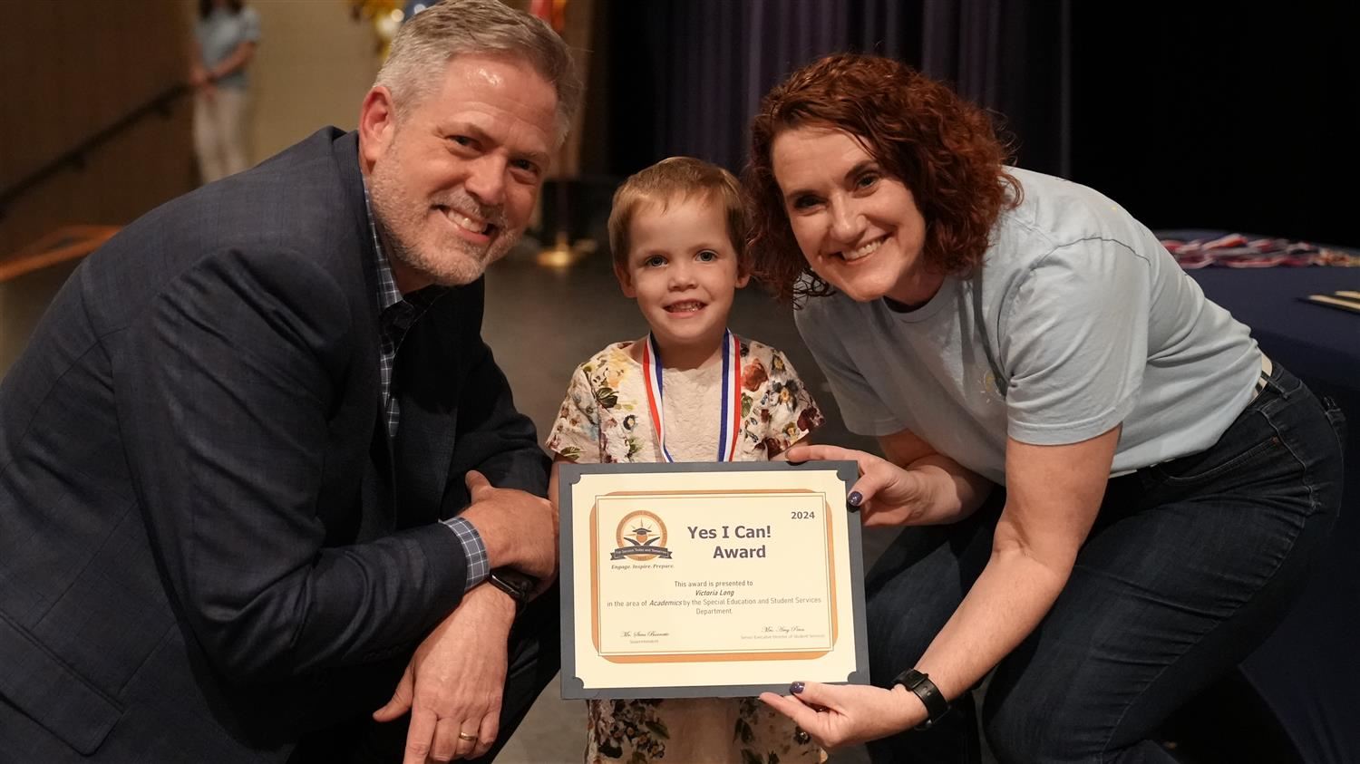 Victoria Long from Roberts ES pictured with Superintendent Steve Barnette and Senior Executive Director of Student Services A