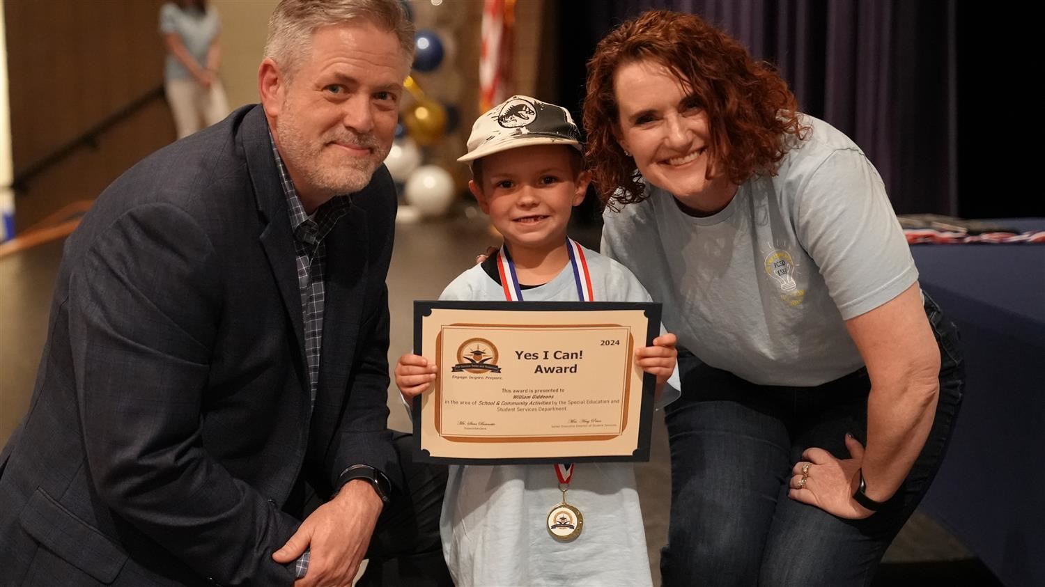 Ridge Lingerfelt from Russom ES pictured with Superintendent Steve Barnette and Senior Executive Director of Student Services Amy Penn.