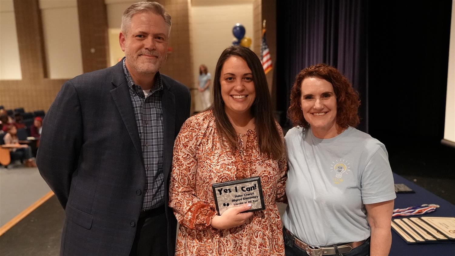 Educator of the Year winner Haley Cowart from Allgood ES pictured with Superintendent Steve Barnette and Senior Executive Dir