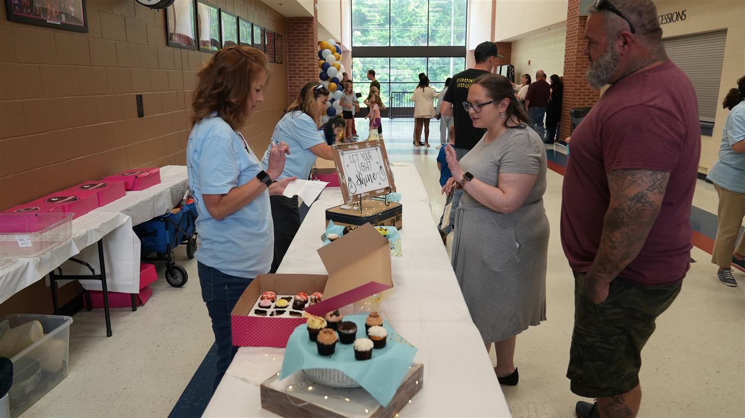 Parents in line for a cupcake