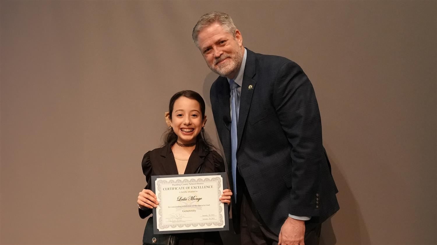 Character In Action - Generosity: Superintendent Steve Barnette and Leila Monge​ from Allgood Elementary.