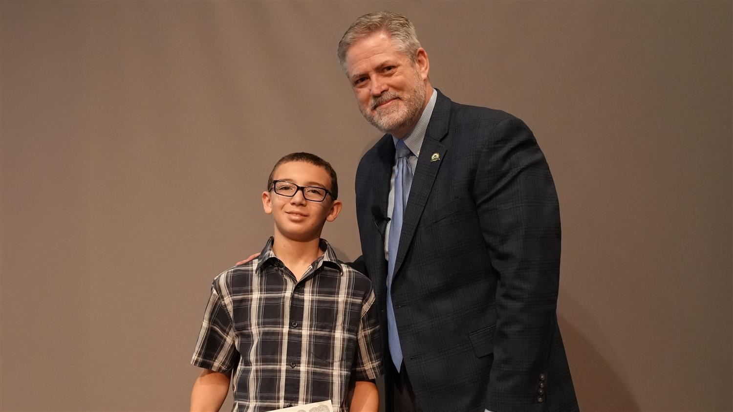Character In Action - Generosity: Superintendent Steve Barnette and Tony Young from Ragsdale Elementary.