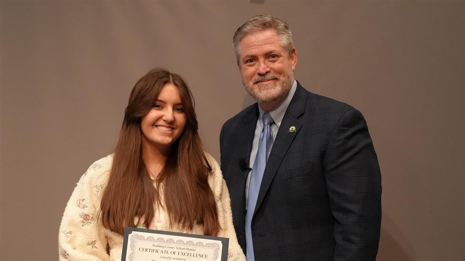 Fine Arts in Action - North Paulding High School AP Art Project: Superintendent Steve Barnette and Cambrie Winkles​.