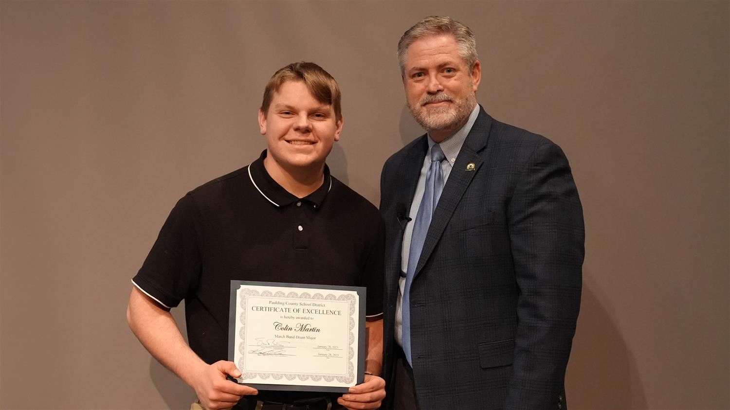 Marching Band Drum Majors: Superintendent Steve Barnette and Colin Martin​ from South Paulding High.