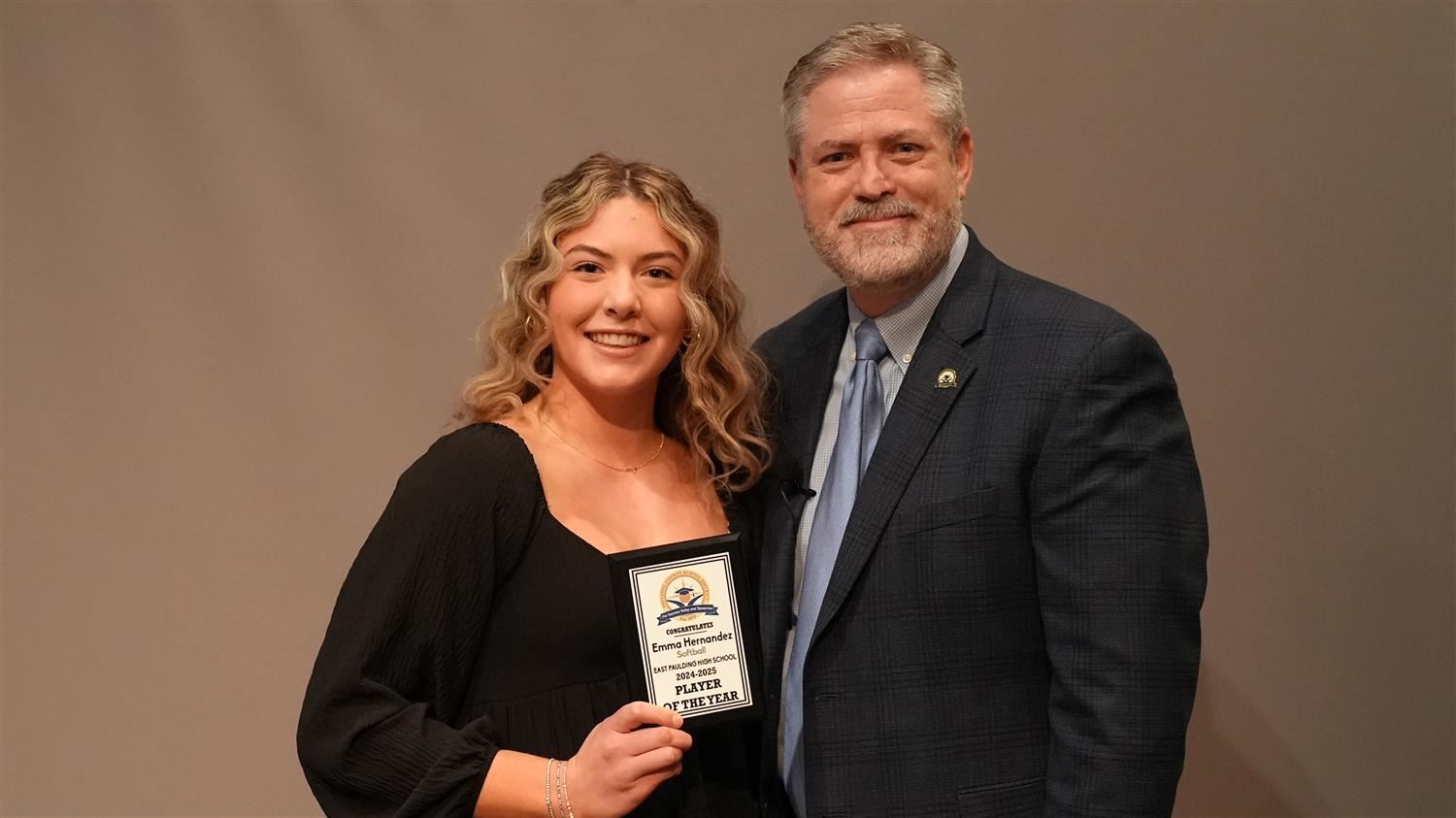 Fall Sports Players of the Year - Softball: Superintendent Steve Barnette and Emma Hernandez from East Paulding High.